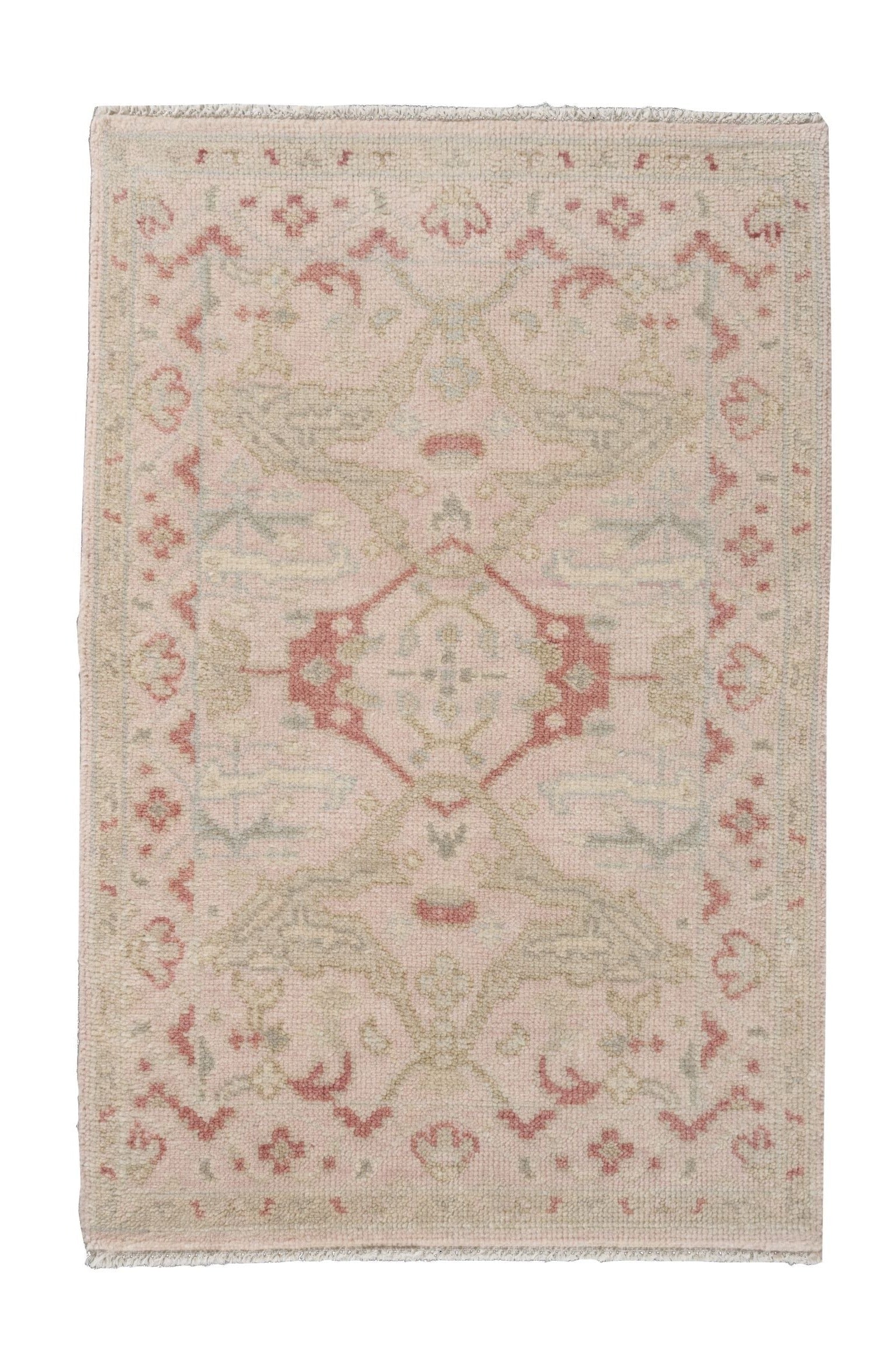 Neutral toned and hand-knotted Oushak style rug made of 100% New Zealand wool. This rug is comprised of pink, beige, tan, salmon, coral, blush, blue, ivory colors. 