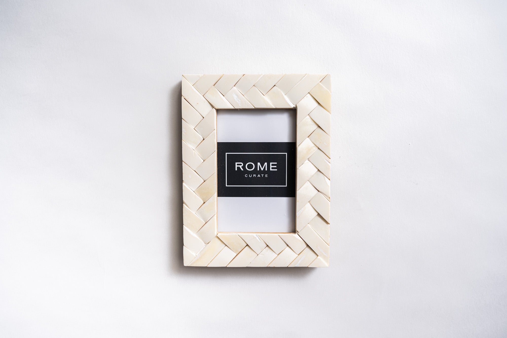 Bone weave photo frame