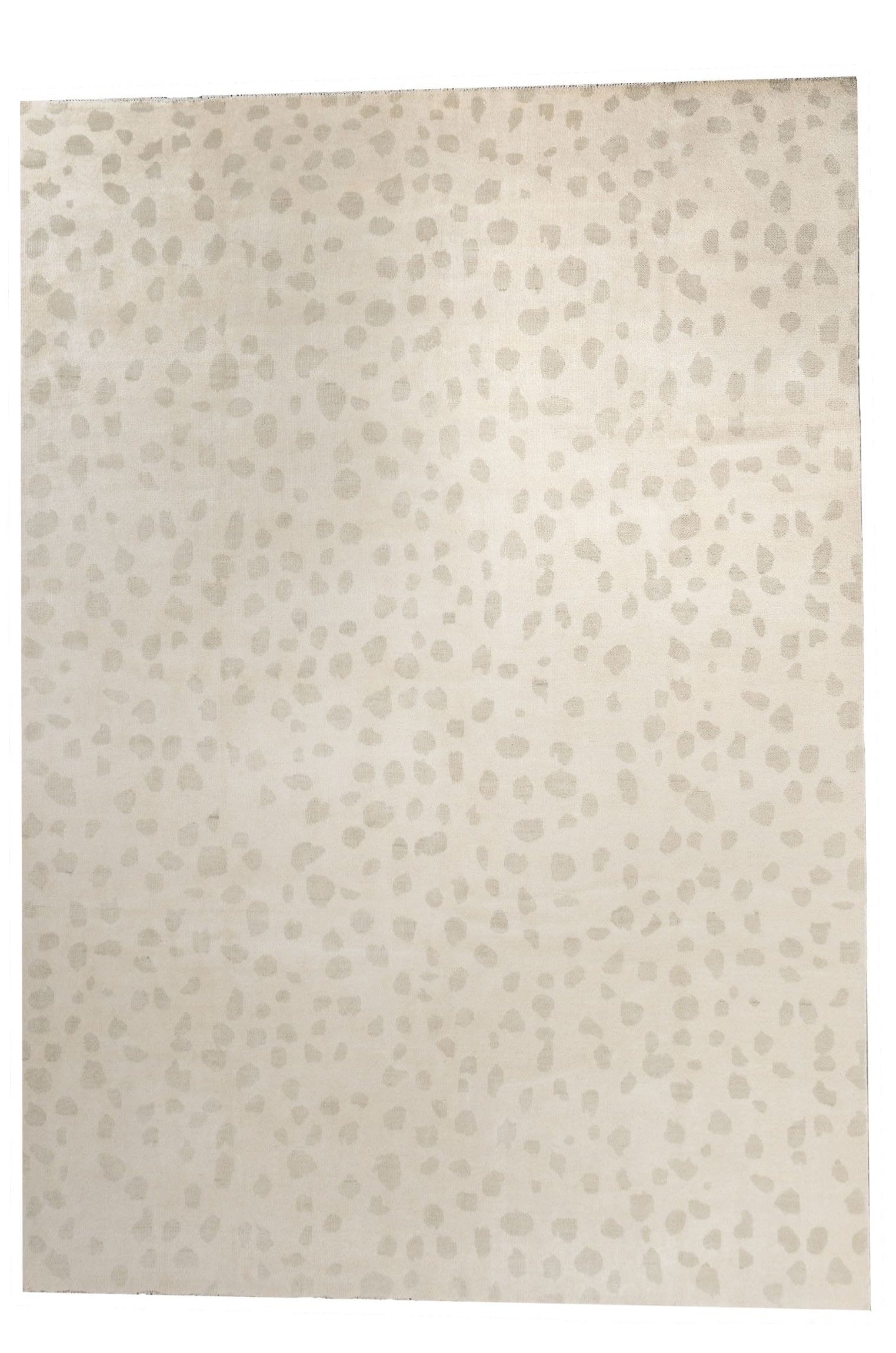 Neutral toned and hand-knotted Oushak style rug made of 100% New Zealand wool. This rug has a unique spotted pattern with beige, ivory, and gray colors.