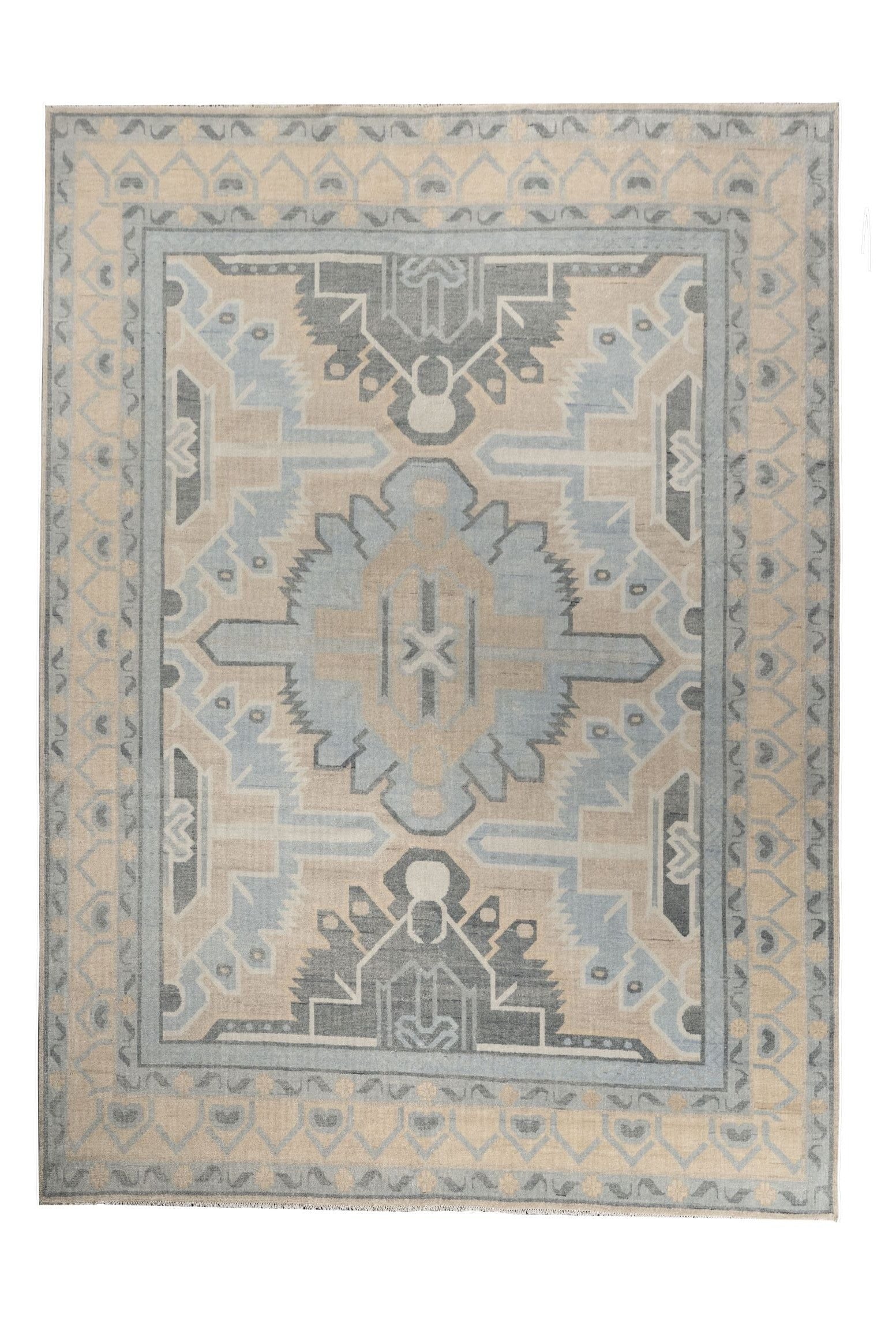 Neutral toned and hand-knotted Oushak style rug made of 100% New Zealand wool. This rug is comprised of blue, light blue, ivory, beige, charcoal, and gray colors. 