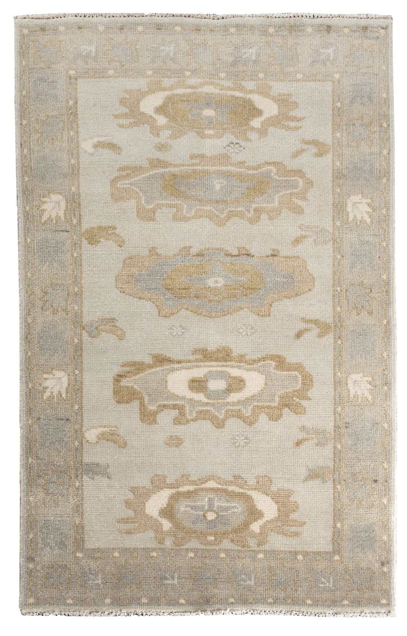 Neutral toned and hand-knotted Oushak style rug made of 100% New Zealand wool. This rug is comprised of tan, taupe, beige, brown, gray, and ivory colors.