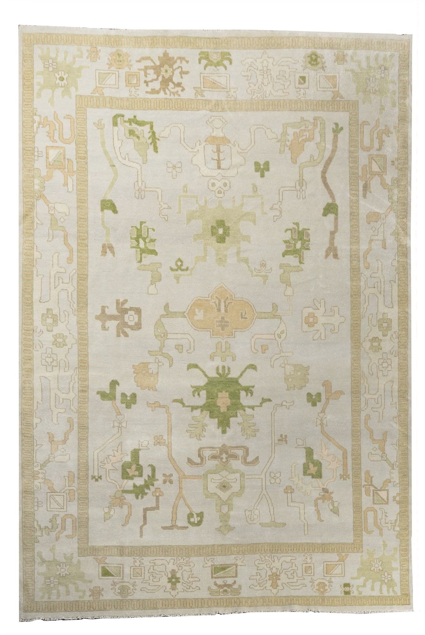 Neutral toned and hand-knotted Oushak style rug made of 100% New Zealand wool. This rug is comprised of green, beige, tan, ivory, brown, lime green, and gray colors. 