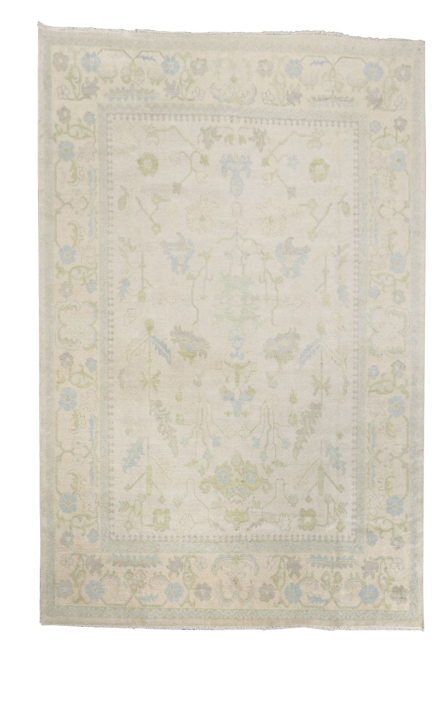 Neutral toned and hand-knotted Oushak style rug made of 100% New Zealand wool. This rug is comprised of blue, light blue, ivory, beige, gray, green, and light green colors. 